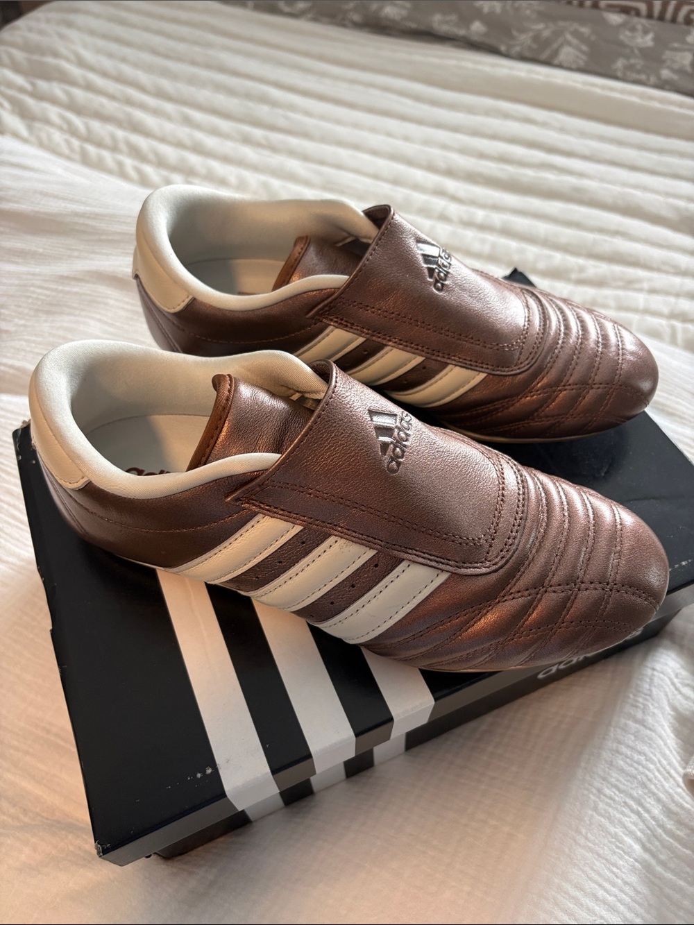 adidas Women’s Brown Slip-On Sneakers with White Stripes